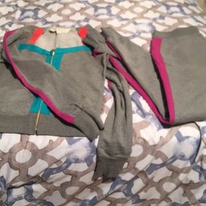 Light material sweat suit. Super comfy and cute.